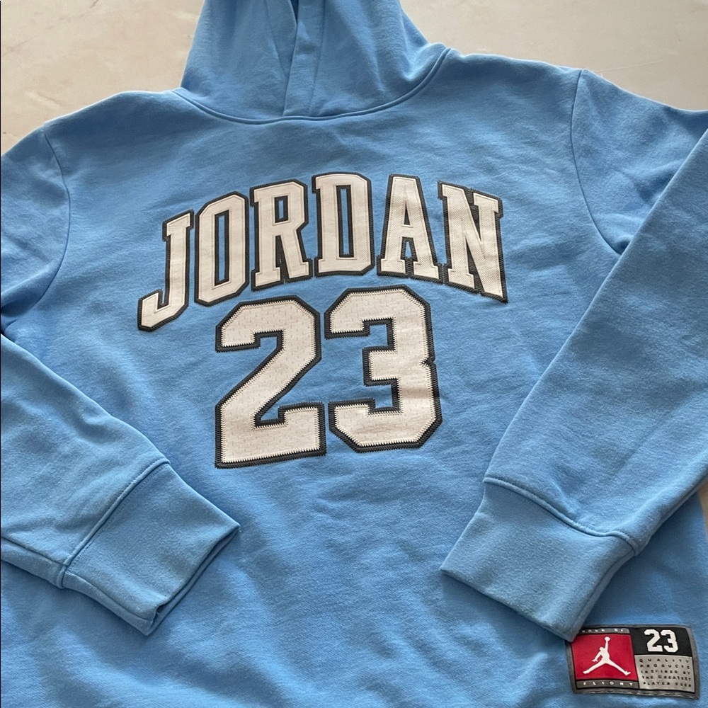 Youth Jordan Light Blue Hoodie with 23 Logo
Size Large ‘age 12-13 years’